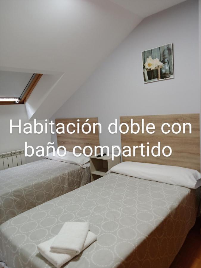 Pension Ameneiral O Pedrouzo Quarto foto